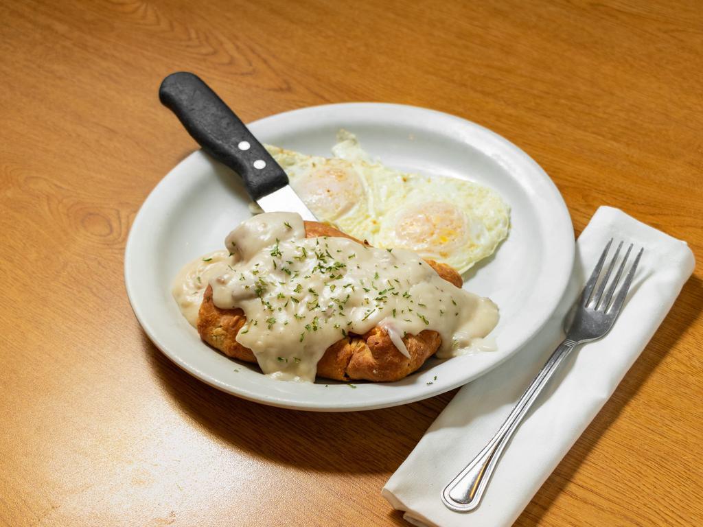 Stuffed Biscuits and Gravy · A giant fresh-baked biscuit stuffed with sausage, peppers, onions and cheese, topped with gravy. Served with 2 eggs.