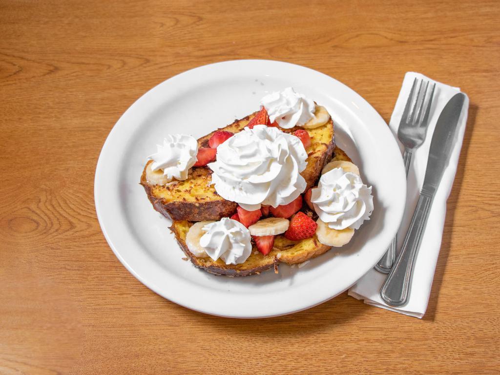 French Toast Crunch · Sweet granola-crunch coating, strawberries, bananas and whip.