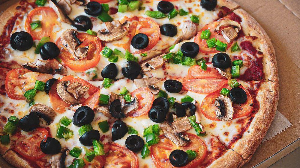 Alonzo's Veggie Pizza · Original crust, mushrooms, black olives, red onion, bell pepper, fresh tomatoes and lite garlic. Vegetarian.