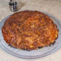 Large Apple Pancake · Oven baked with fresh apples, pure saigon cinnamon glaze.