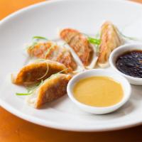 Vegetable Potstickers (6) · Vegetarian. Served with ginger soy dipping sauce.