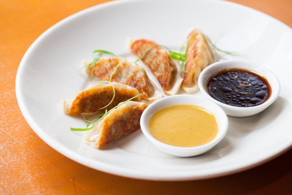 Vegetable Potstickers (6) · Vegetarian. Served with ginger soy dipping sauce.