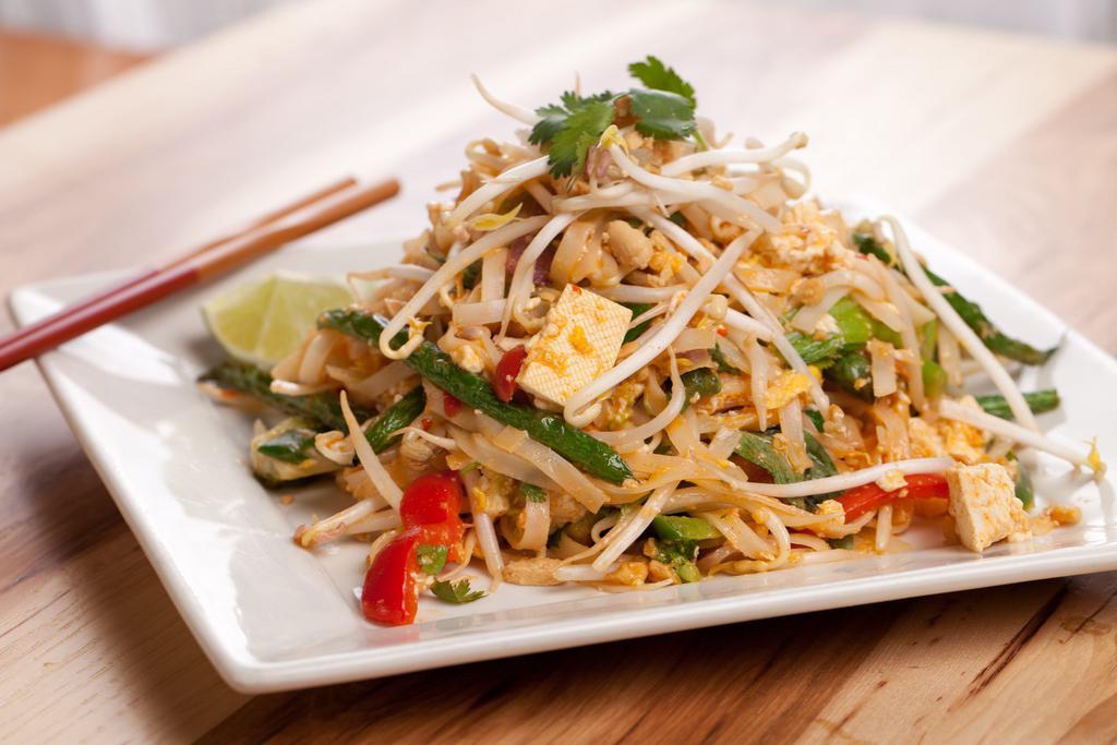 Vegetable Pad Thai · Thailand's famous dish, ours has the clean, bright taste of fresh lemon, Thai basil, cilantro, eggs, sprouts, peanuts and rice noodles.