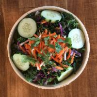 Banh Mi Salad · Shredded kale, red cabbage, pickled carrots and daikon, cucumber and cilantro.  With Ginger ...