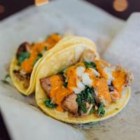 2 Street Tacos · Meat, cilantro and onions.
