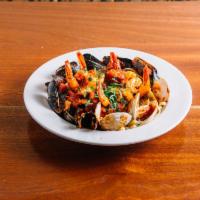 4. Shrimp Fra Diavolo · Jumbo shrimp with clams and mussels in a spicy marinara sauce.