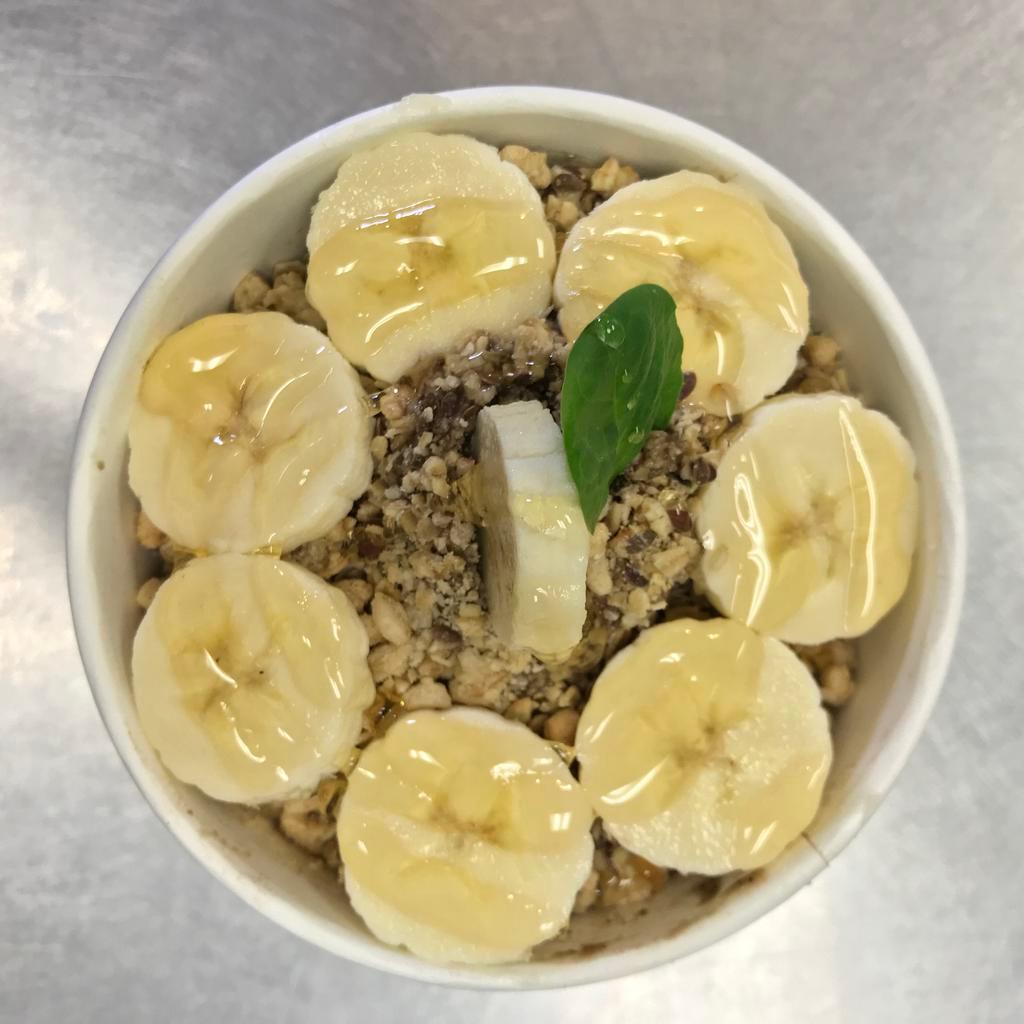 Popeye Acai Bowl · Blend: organic acai, strawberries, pineapple, blueberries, 100% apple juice, banana, fresh kale, fresh spinach and MAQ 7. Toppings: organic granola (hemp and flax seed), bananas and honey.