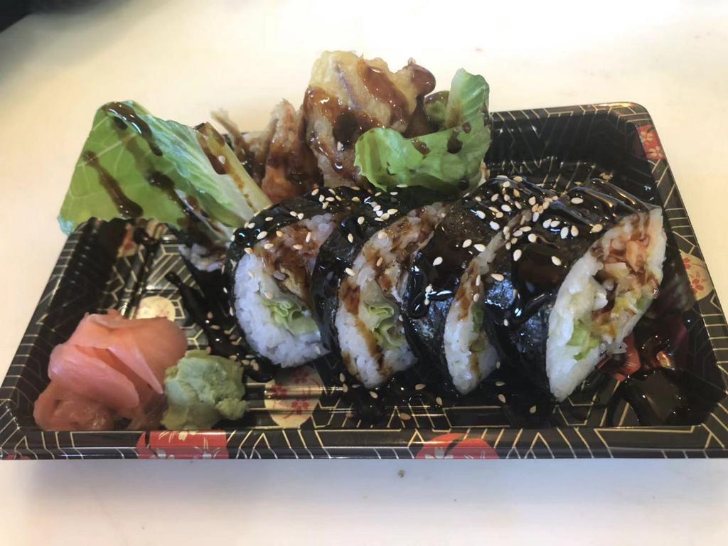 6 Pieces Spider Roll · Deep fried soft shell crab and spicy crab mix, cucumber and avocado inside and topped with eel sauce.
