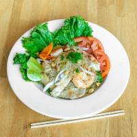 Yum Woon Sen Salad · Woon sen (clear bean thread noodle), spicy lime dressing, chicken, shrimp, onions, tomatoes,...