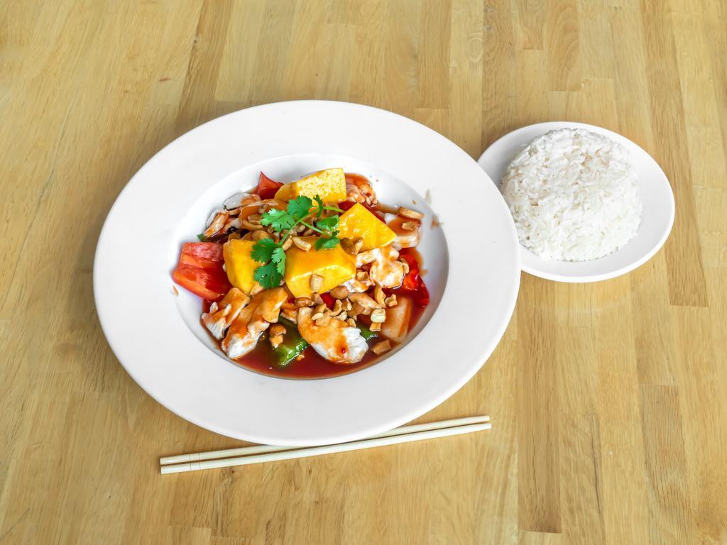 Pad Mango · Mango, bell peppers and onions stir-fried in special Thai sauce with cashews. Gluten-free.