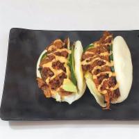 Spicy Pork Buns (2pcs) max. 4 orders · Barbequed spicy pork with cucumber and lettuce in a steamed bun