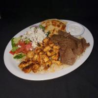 Mixed Gyro Platter · Chicken gyro and lamb & beef gyro. Served with rice, Greek salad, and the Host's fresh-baked...