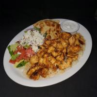 Chicken Gyro Platter · Thinly sliced, spit roasted marinated chicken. Served with rice, Greek salad, and the Host's...