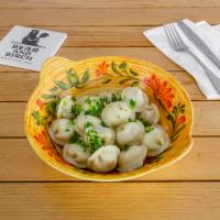 Pelmeni · 25-30 pieces. Homemade hand-rolled Siberian dumplings (chicken or pork).