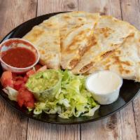 Quesadilla · Choice of meat and cheese inside. Lettuce, tomato, sour cream, guacamole and salsa on the si...
