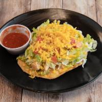 Crispa · Fried flat flour tortilla with your choice of meat, cheese, guacamole, lettuce and tomato. 