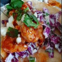 Shrimp Taco · 2 Grilled shrimp tacos on a corn tortilla with homemade coleslaw, queso fresco, cilantro and...