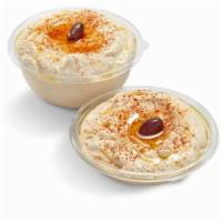 Hummus · A refreshing, nutty spread made from chickpeas, tahini, lemon juice, fresh garlic and olive ...