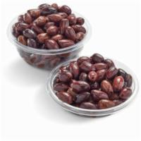 Kalamata Olives · Picked from the Kalamata region in Greece, these premium pitted olives are firm and have a s...