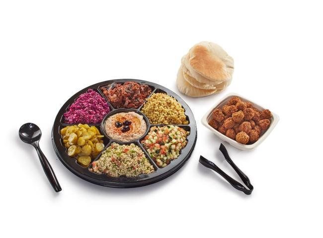 Mediterranean Platter (Feeds 6 People) · Create your own Mediterranean platter!

Choose your protein: Falafel, All Natural Chicken Shawarma or Half and Half.

Choose an assortment of 7 items.
Served with:
Hot Sauce
6 fresh baked pitas

-Serves 6 people.
