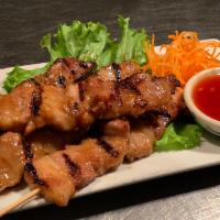 Moo Yang Kati Sod · Grilled marinated pork belly, spicy lime sauce