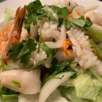 Yum Talay · Shrimp, squid, scallop, onions, scallions, carrots, celery, Thai chili, spicy fresh lime jui...