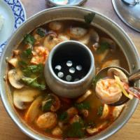 Tom Yum Goong · Spicy lemongrass soup, shrimp, and roasted chili paste (Gluten Free, Vegetarian)