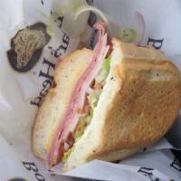 Torpedo Sandwich · Ham, dry salami, cotto salami, bologna, provolone, veggies, mayo, mustard, oil and vinegar.