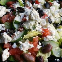Greek Salad · Crisp lettuce, tomatoes, onions, cucumbers, olives and feta cheese. Served with your choice ...