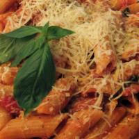 Penne Alla Vodka · Penne pasta in a delicious vodka sauce. made with butter, heavy cream Parmesan cheese, onion...