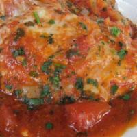 Veal Parmigiana. · Served with Pasta or Salad. Served with Pasta or Salad