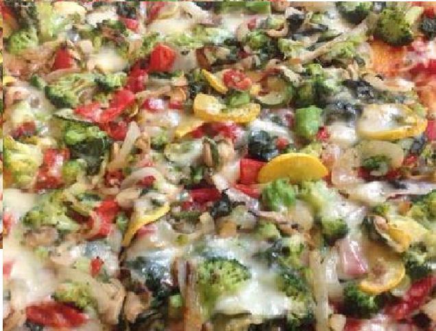 Vegetable Pizza · Sauteed zucchini, onions, mushrooms, roasted peppers, spinach, broccoli and garlic.
