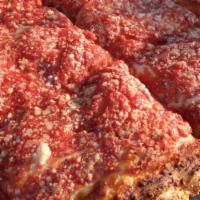 Old Fashion Sicilian Pizza · A Sweet tomato sauce over melted mozzarella cheese topped with Romano cheese