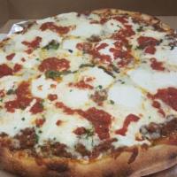 Lasagna Pizza · Meat sauce, topped with ricotta, and mozzarella cheese