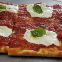 Grandma Pizza · Thin crust square pizza with marinara sauce, fresh mozzarella and basil.