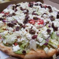 Greek Salad Pizza · Lettuce, tomato, cucumbers, onions, olives and feta cheese