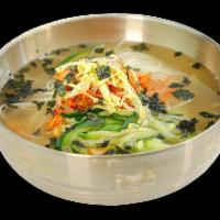 Janchiguksu 잔치국수 · Wheat noodles in broth with veggies and kimchi