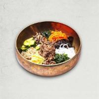 Bibimbap 비빔밥 | 拌饭 · Beef and vegetable mixed rice. Steamed rice topped with sauteed assorted vegetables.