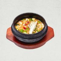 Deonjang Jjigae 된장 찌개 | 大酱汤 · Stew made with traditional Korean soybean paste, beef, tofu, and assorted vegetables.
