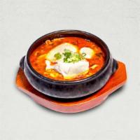 Spicy kimchi soft tofu soup 김치 순두부 | 辣白菜豆花汤 · Hot and spicy stew made with soft tofu, kimchi, and pork.
