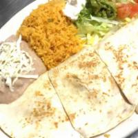 Cheese Quesadilla Appetizer · The cooked tortilla is filled with cheese and folded in half. 
