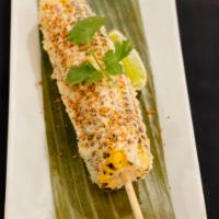El Elote · Grilled corn on the cob, lime aioli, cotija cheese and a touch of tajin.