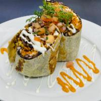 Burrito de Pollo · Flour tortilla stuffed with Marinated grilled chicken thighs, black beans, grilled corn, Mon...