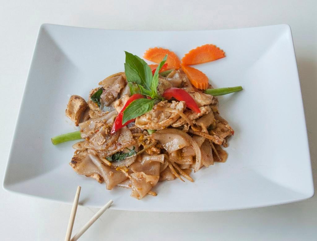 Pad Kee Moa Noodle · Sauteed flat noodle with egg, basil, onion, carrot, sting bean and bell peppers in Thai spicy soy sauce.