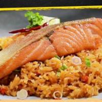 Salmon Fried rice · cook thai style with egg,onion,scalion and carrot on top of grill salmon.