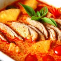 Duck curry. · Tomato,pineapple and mix vegetable in coconut red curry sauce.