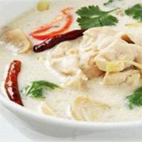 Tom Kha Soup · Mushroom, scallion and cilantro in coconut milk broth.
