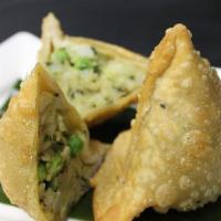 Meat samosa · Triangular pastry stuffed with potatoes and Lamb mince with a hint of spice.