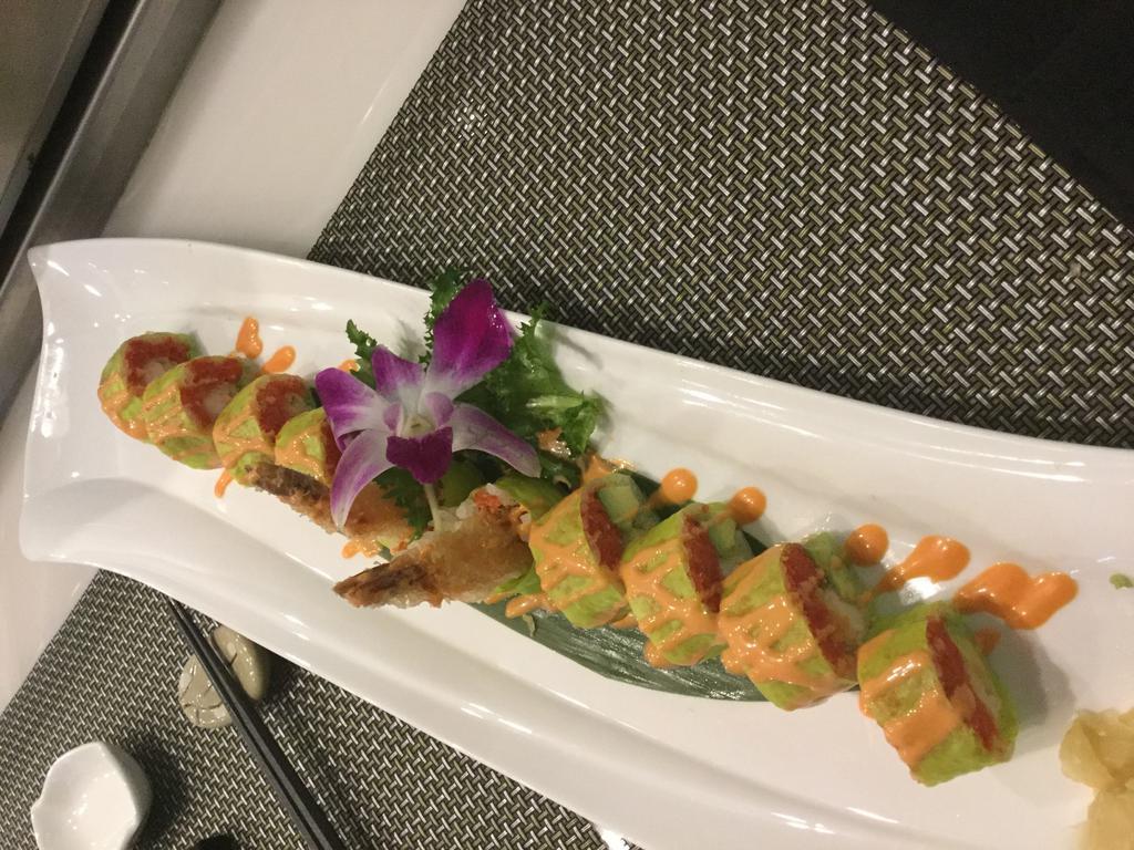 Paradise Roll · Shrimp tempura, spicy tuna and avocado soy bean nori wrapped with spicy mayo.