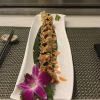 Lobster and King Crab Roll · Lobster tail tempura inside, topped with grill Japanese enoki mushroom and king crab, tobiko...